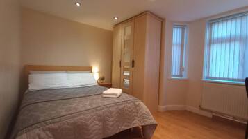 Apartment, 1 Queen Bed | 1 bedroom, iron/ironing board, free WiFi, bed sheets
