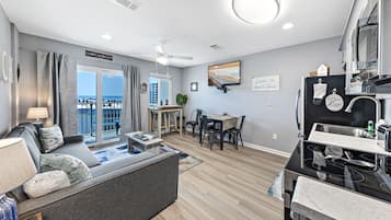 Signature Condo, 1 Bedroom, Balcony, Ocean View | Living room | Smart TV