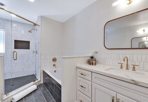 Bathtub, hair dryer, towels
