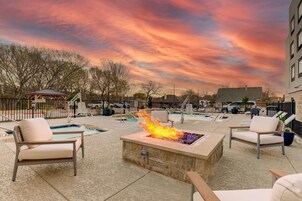 Outdoor pool, open 8:00 AM to 10:00 PM, pool umbrellas, sun loungers