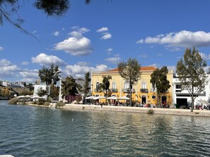 Stroll along the waterfront promenade, taking in the serene views and enjoying the outdoor seating areas.