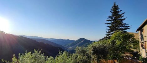 A mountainous landscape with a clear sky.