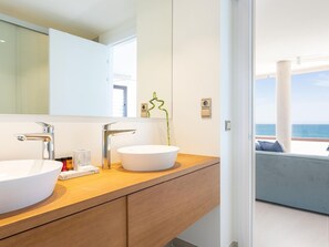 Bathtub, hair dryer, towels