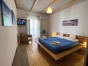 2 dormitorios, escritorio, tabla de planchar con plancha y wifi gratis