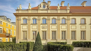 A historic building with symmetrical architecture, large windows, and statues on the roof. - Hotel Verte, Warsaw, Autograph Collection (Warsaw)