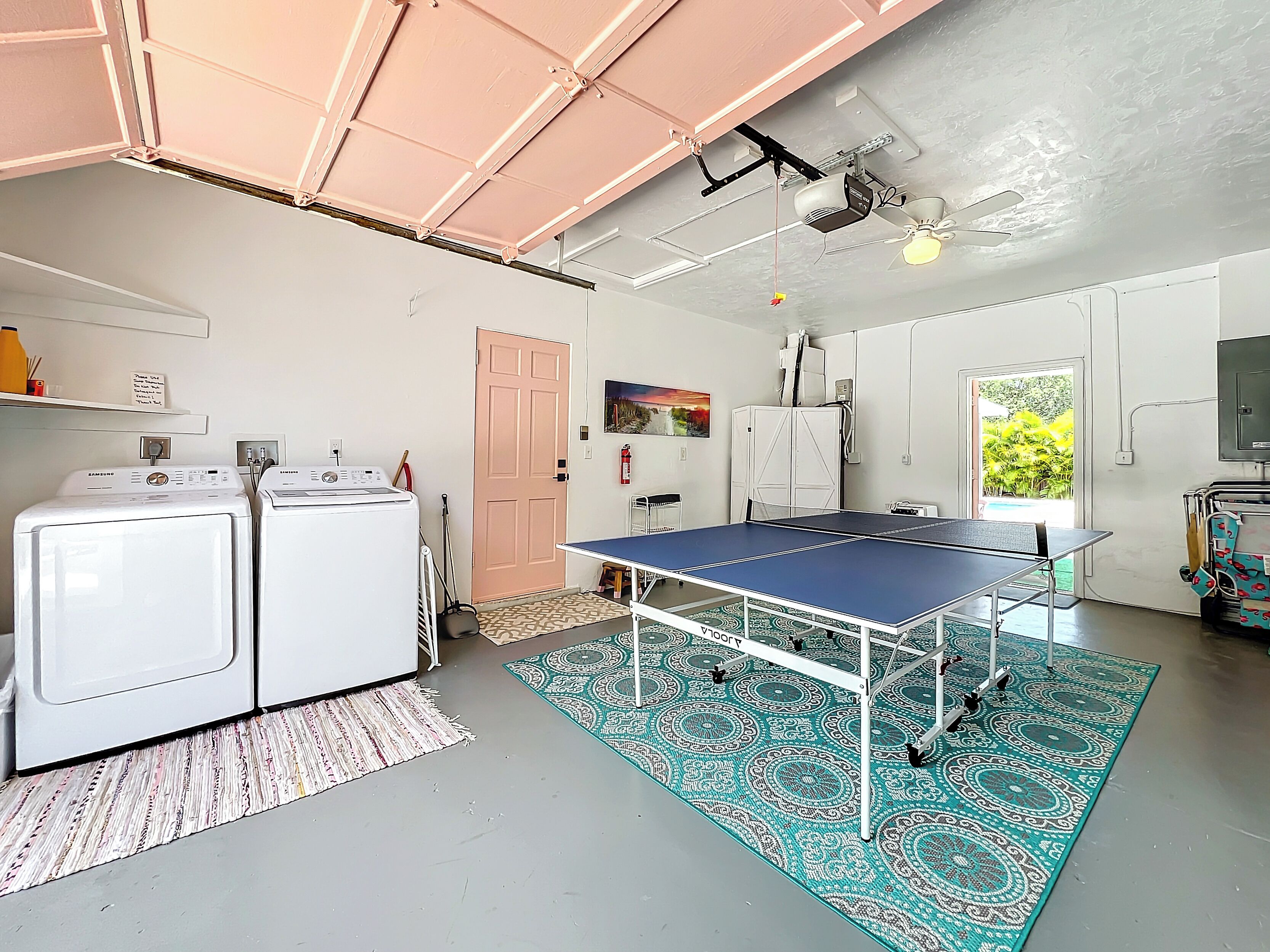 Laundry with game room and beach supplies