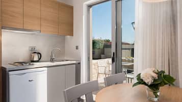 Maisonette With Pool | Private kitchen | Coffee/tea maker, electric kettle, highchair, cookware/dishes/utensils