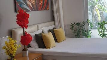 Egyptian cotton sheets, premium bedding, down duvets, Tempur-Pedic beds