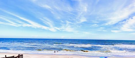 On the beach, sun-loungers, beach towels