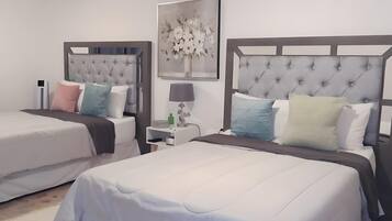 4 bedrooms, premium bedding, down comforters, individually decorated