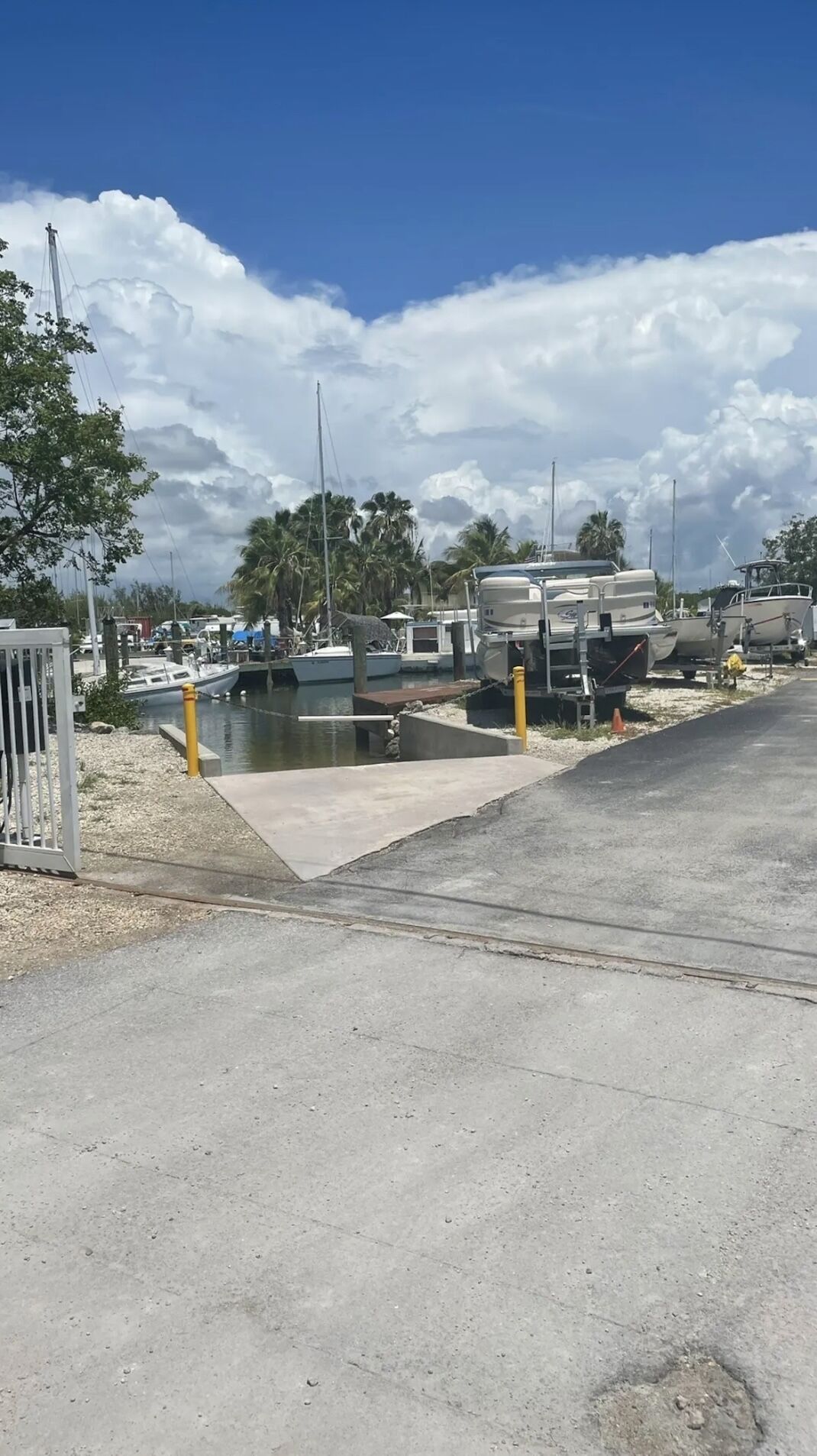 A marina with RVs and boats docked.