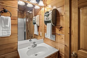 Shower, towels, soap, toilet paper