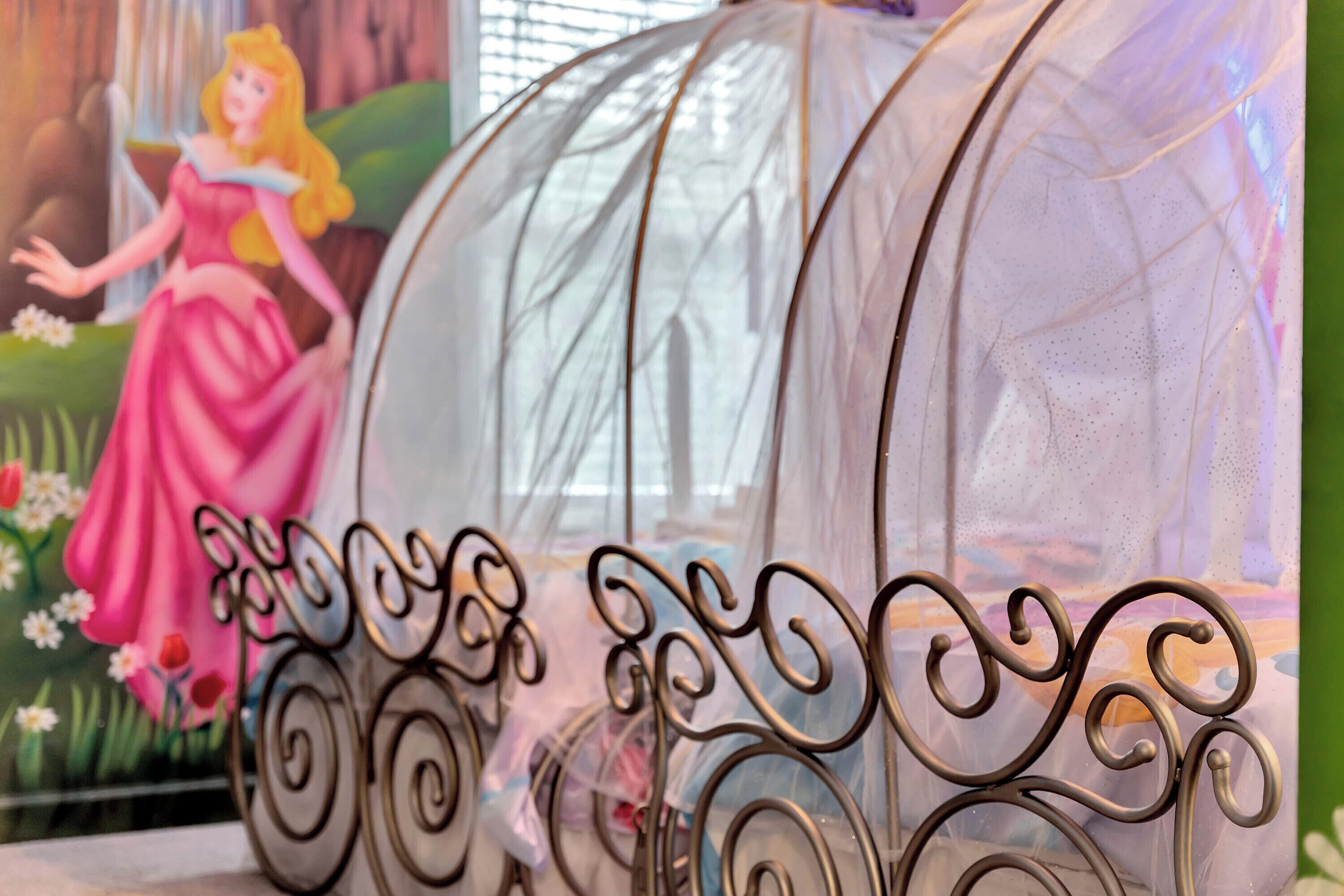 Come into our princess bedroom 5 on second floor with two twin carriage beds. 