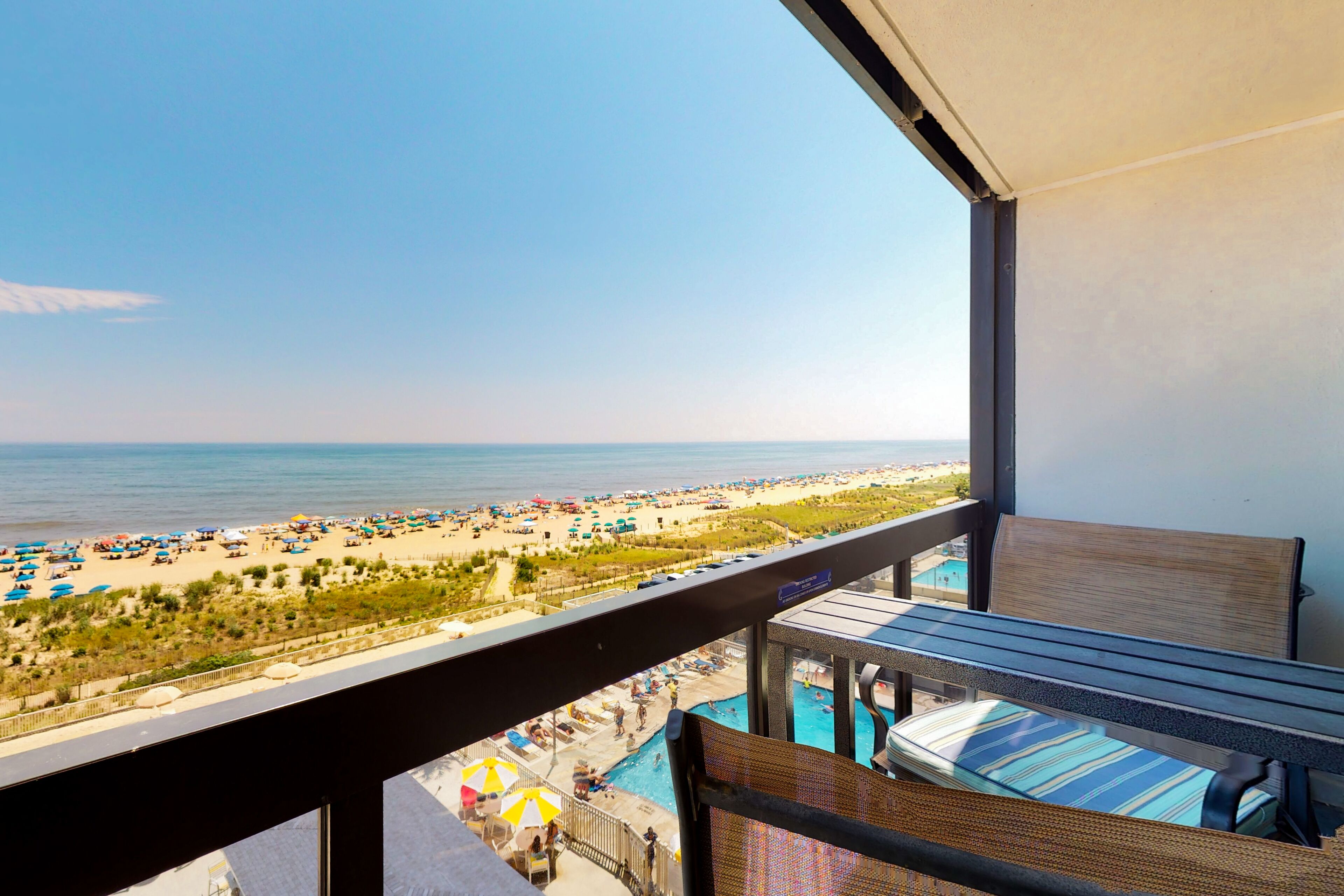 Oceanfront condo with a balcony, central AC, pools, game room & sports courts