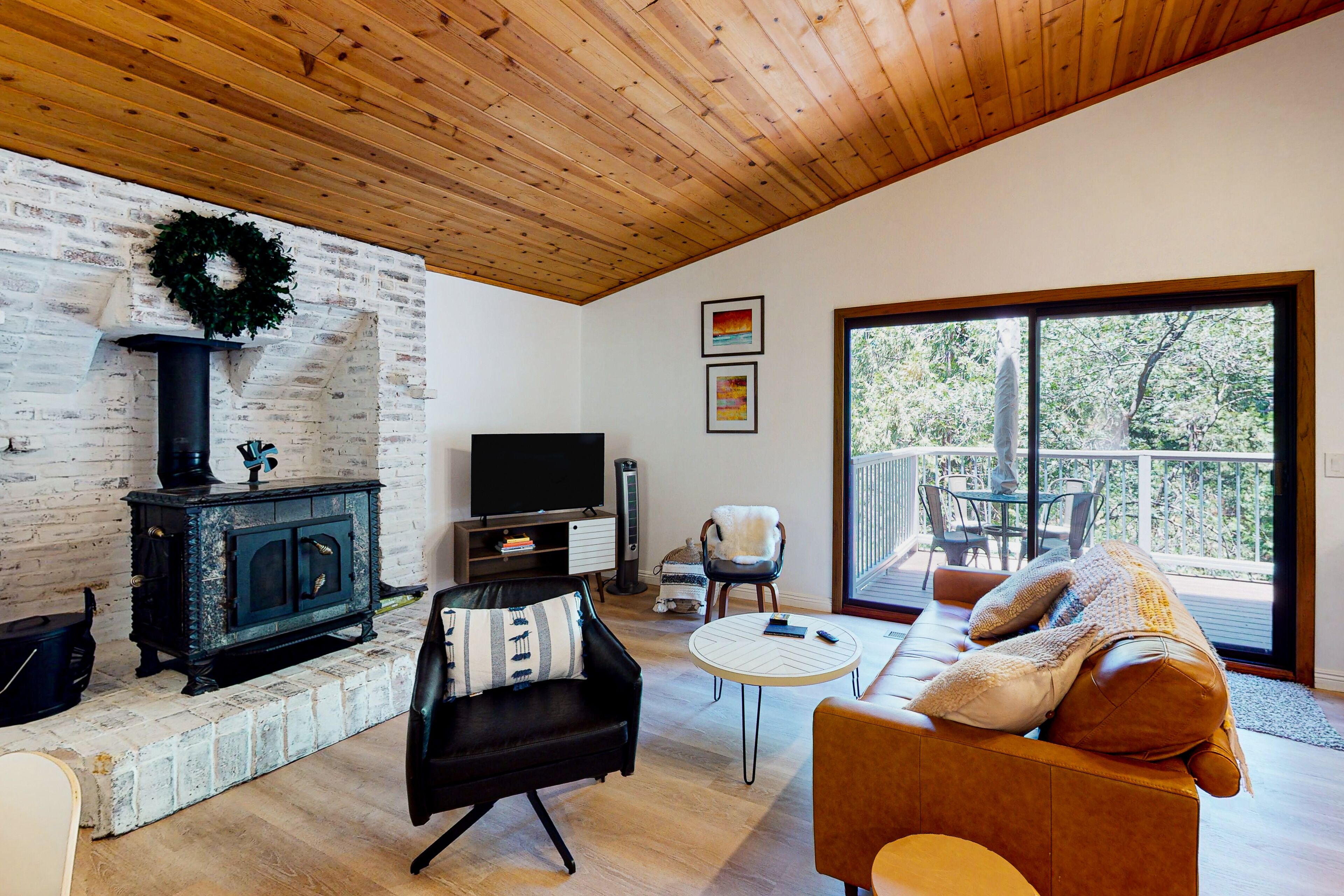 Updated home with central AC, W/D, wood stove, home office & high-speed WiFi