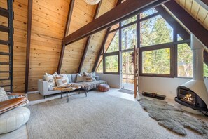 TV, fireplace - Mid Century Modern Cabin - The Tahoe A-Frame (Homewood)