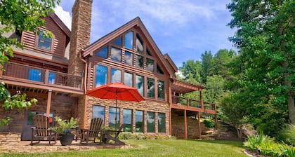 Luxe lakefront retreat with fishing dock, deck, firepit, patio & pool table