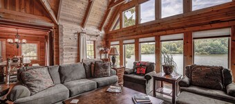 Luxe lakefront retreat with fishing dock, deck, firepit, patio & pool table