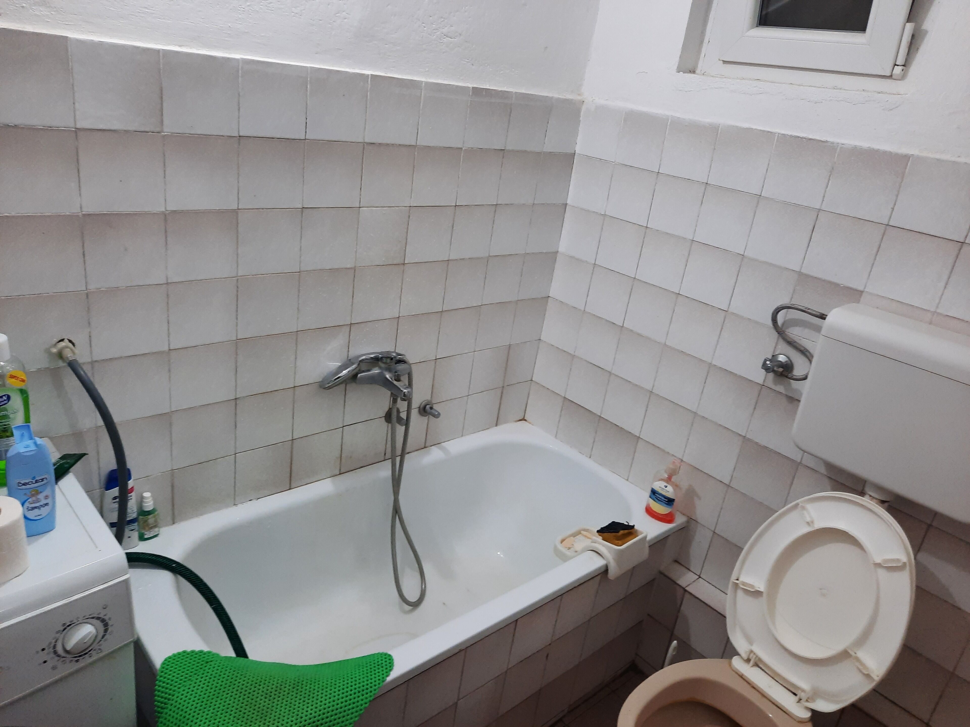 Combined shower/tub, hair dryer, towels, soap