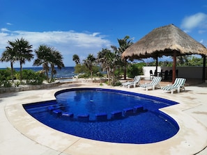 Outdoor pool, open 8:00 AM to 8:00 PM, sun loungers