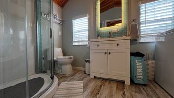 Shower, eco-friendly toiletries, hair dryer, towels