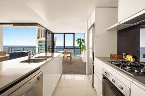 Superior Apartment | Private kitchen | Full-size fridge, microwave, oven, stovetop