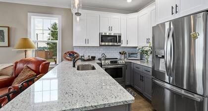 Lovely townhome with water-view, balcony, central AC & washer/dryer