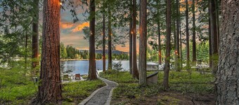 Lakefront cottage with docks, kayak, deck, firepit & beachfront, drive to skiing