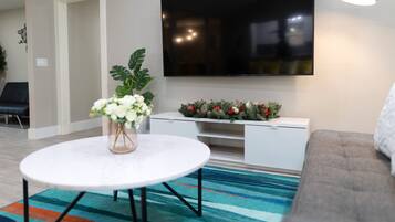 Smart TV, fireplace, foosball, books