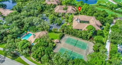 2nd-floor condo with private beach access, lanai, and access to heated pool