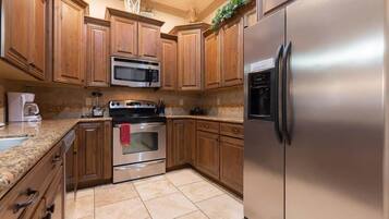 Coffee/tea maker, fridge, microwave, oven