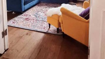 Basic Townhome, Multiple Beds | Living room | TV