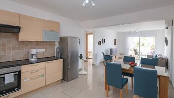 Comfort Apartment | Living area | TV