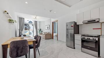 One Bedroom family apartment with Burj Khalifa View | Dining room