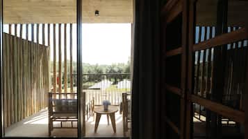 Habitación Signature, 1 cama de matrimonio, balcón, vistas al jardín | 1 dormitorio, sábanas de algodón egipcio, ropa de cama de alta calidad