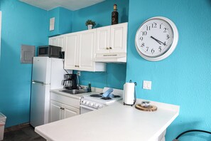 Fridge, microwave, coffee/tea maker, electric kettle
