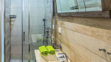 Eco-friendly toiletries, hair dryer, towels