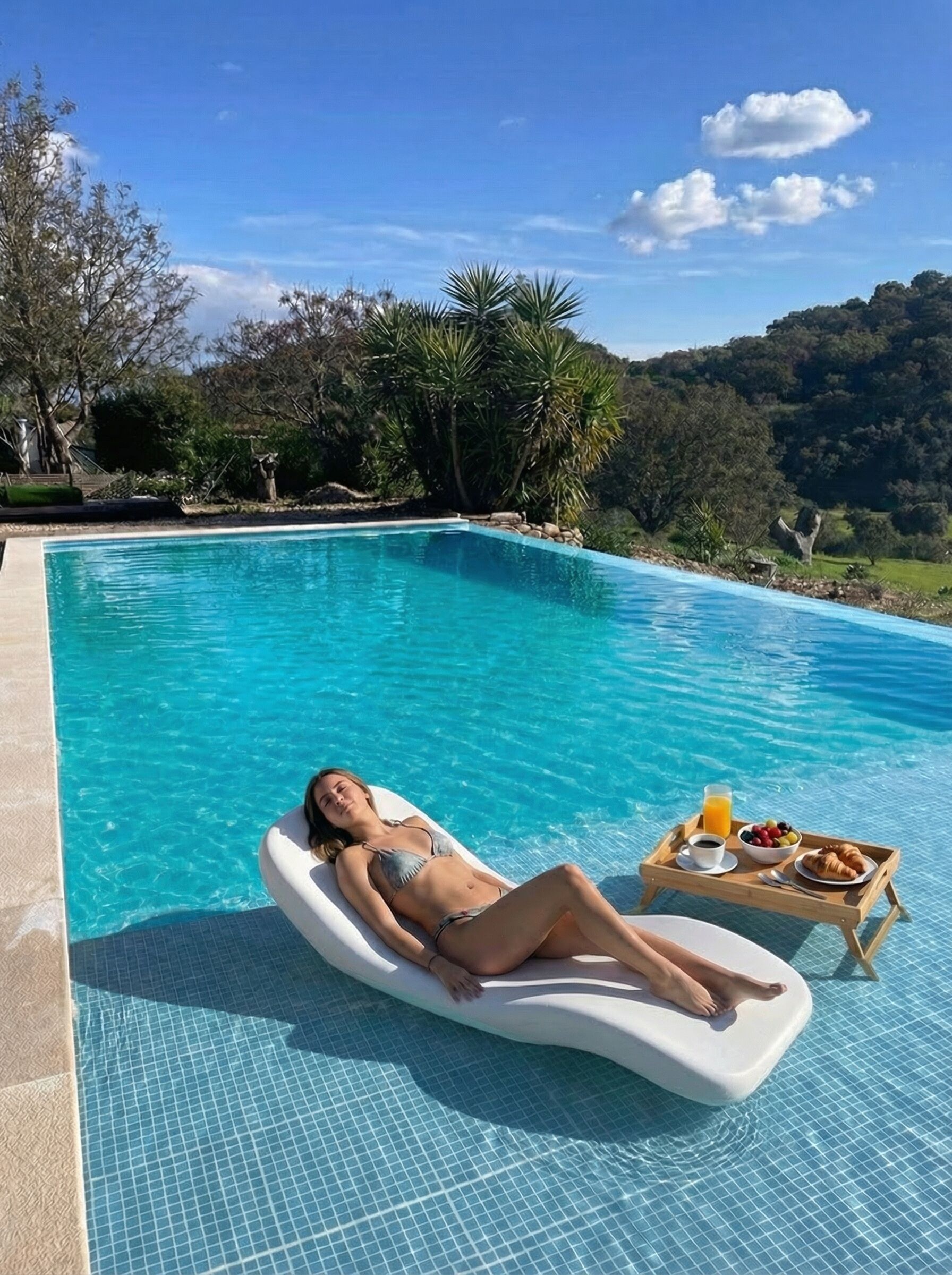 Outdoor pool, pool umbrellas, pool loungers