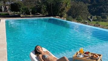 Outdoor pool, pool umbrellas, pool loungers