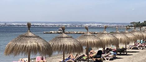 Beach nearby, sun loungers