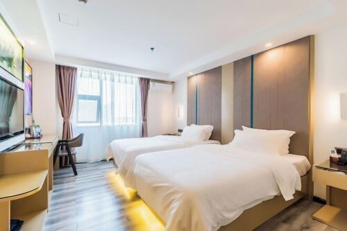 Wuchuan Cafeir Hotel