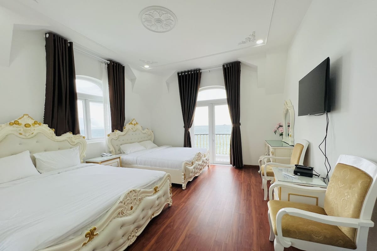 Habitación ejecutiva | Ropa de cama de alta calidad, minibar, wifi gratis y ropa de cama