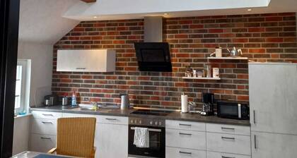 Core-serviced apartment directly on the small dike for up to 4 people