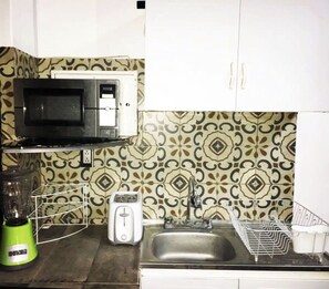 Fridge, microwave, coffee/tea maker, electric kettle