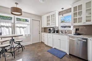 Microwave, stovetop, dishwasher, coffee/tea maker
