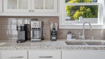 Microwave, stovetop, dishwasher, coffee/tea maker