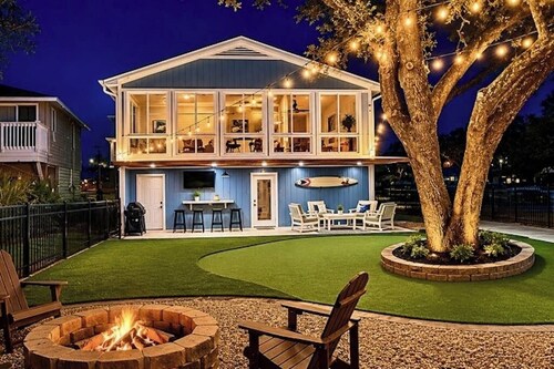 Waterfront home with dock, deck, firepit, grill, kitchen & wet bar