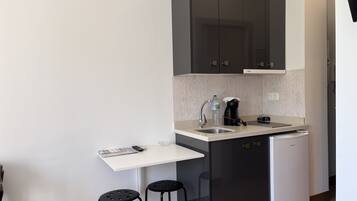 Fridge, microwave, toaster, cookware/dishes/utensils