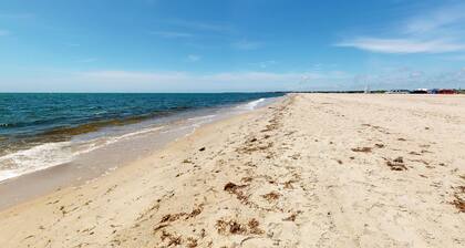 Waterfront escape with gas grill, furnished deck, fast WiFi, beach access nearby