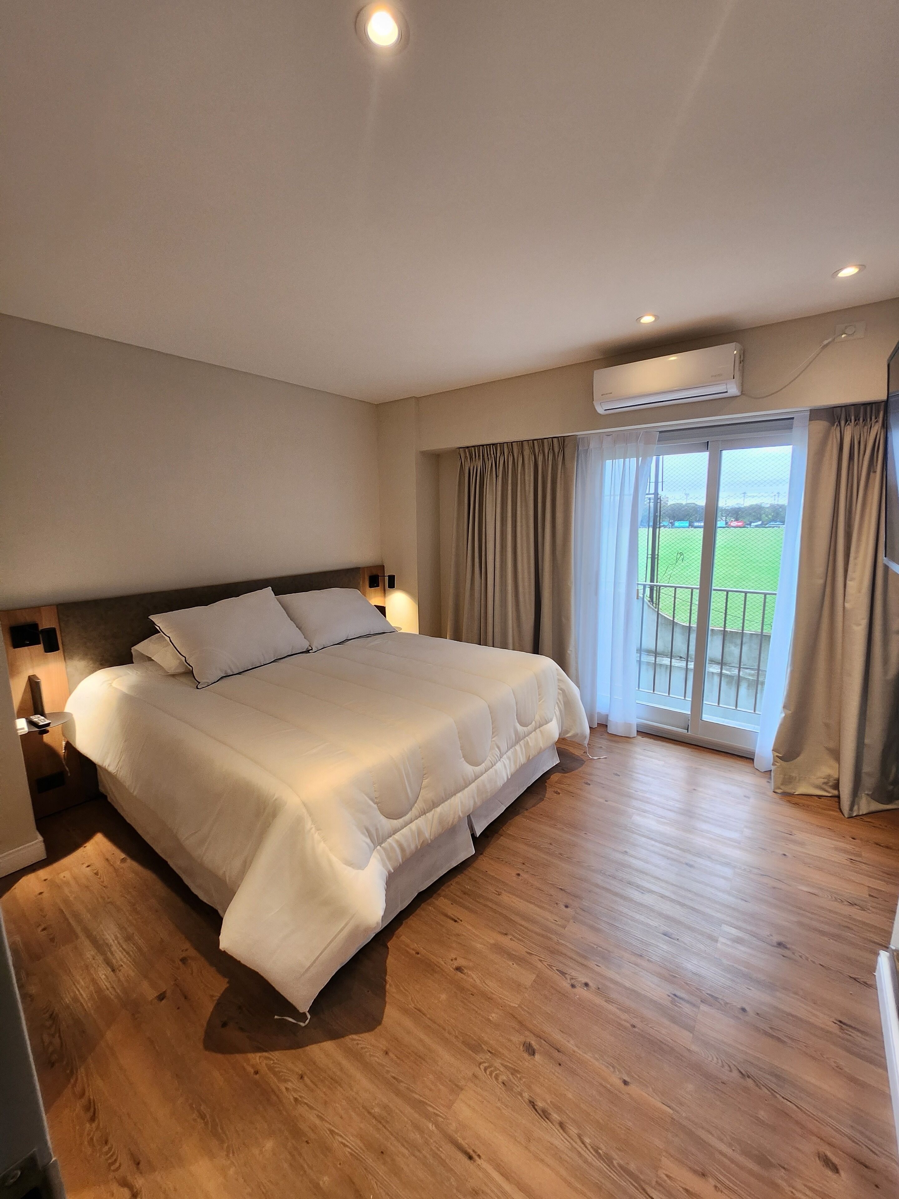 grand room | premium bedding, select comfort beds, in-room safe, blackout curtains